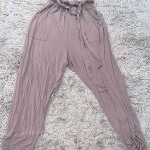 Grey slouchy pants , dress it up or comfy down . Super comfy and flattering